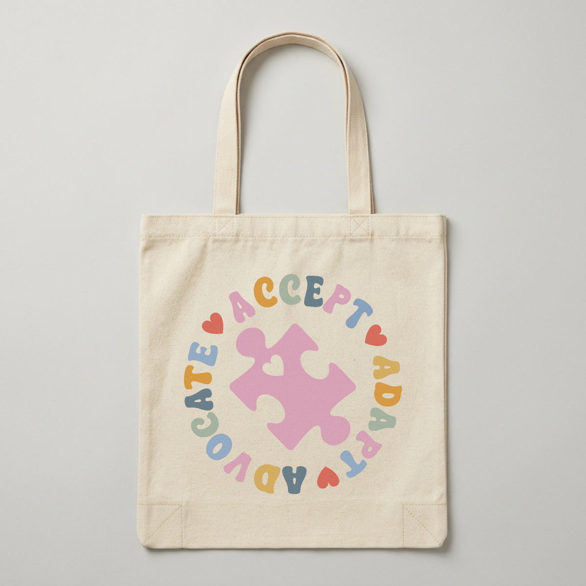 Carry your values with this thoughtfully designed tote bag. The "Acceptance Advocate ABD Adapt" message celebrates inclusivity, mindfulness, and personal growth. Perfect for daily use whether heading to work, running errands, or heading to the gym. Durable canvas construction withstands everyday wear, while spacious interior compartments keep your essentials organized. The comfortable handles make it easy to carry, and the timeless design pairs well with any outfit. A meaningful accessory that sparks conver