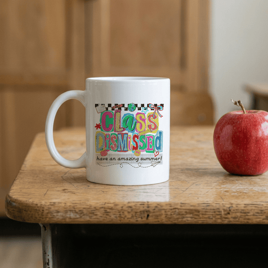 Celebrate the end of the school day with this fun ceramic mug featuring a "Class Dismissed" design. Perfect for teachers, students, and anyone who loves school-themed humor. Durable, dishwasher-safe, and holds your favorite hot or cold beverages. A great gift for back-to-school season or as a thoughtful present for educators.